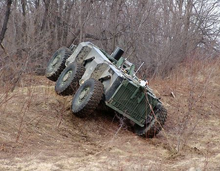 Illustration for article titled DARPA's Crusher Drives Itself, Laughs at Your Puny "Traffic"
